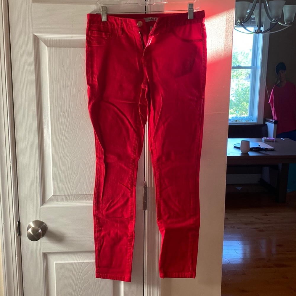 Beautiful red skinny jeans! NEVER WORN